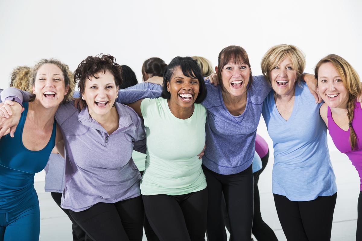 Stock image of a group of middle-aged women smiling