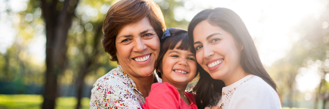 three multigenerational women smiling